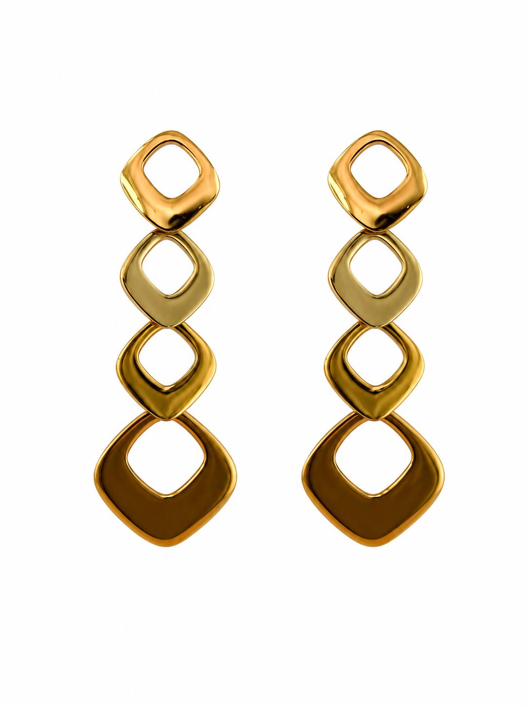 Pendientes Nerea de acero inoxidable dorados, diseño geométrico · D'Capricho